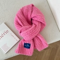 Detailed view of fluffy pink winter scarf texture with navy brand woven label - Pink (3Y Blue Label 1991)