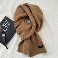 Detail of 100% wool knit scarf in camel showing ribbed texture and soft thick fabric - 22*160cm / Camel