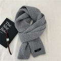 Detailed view of grey thick knit wool scarf showing 100 percent wool label texture - 22*160cm / Light Gray