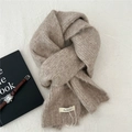 Detail shot of oatmeal alpaca wool knitted scarf texture with product tag and accessories - 20cmx150cm / Beige Coffee