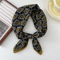 Elegant black and mustard paisley cotton linen square scarf tied in a stylish knot - Paisley Black