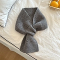 Detail of gray knitted scarf with honeycomb texture and functional slot design - Gray