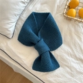 Close-up of deep blue chunky knit scarf with a practical cross-over slit design - Lake Blue