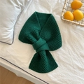 Detail of dark green knit scarf featuring a textured diamond weave and cross-hole design - Dark Green