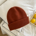 Detalle del tejido de punto del gorro de invierno color caramelo con borde doblado - Talla única / Naranja