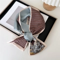 Narrow silk scarf with mixed paisley and geometric patterns on a beige background - Multi-Pattern Paisley Splice Blue