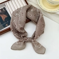 Brown paisley linen scarf with white floral patterns shown tied in a stylish knot - Khaki Floral Leaf Paisley (11 Cotton) / 58*58cm