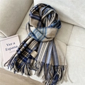 Detail of 100% cashmere scarf label and fringed edge on a classic plaid winter wrap - Wool Multi-Line Striped Blue