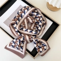 Narrow silk scarf featuring brown and blue geometric patterns in a luxury gold frame - Woven Geometry Blue Brown