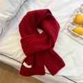 Detail of red vertical stripe knit wool scarf with 100% wool label on white fabric - Red - Thick Ribbed Style (23*170cm)