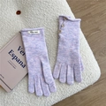 Close-up of purple knit glove with three brown decorative buttons on the wrist cuff - One Size / Purple