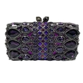 Detail of purple rhinestone clutch bag featuring multi-shaped crystal stones and metal clasp - Deep purple