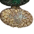 Detail view of champagne gold crystal rhinestones on an oval evening clutch bag - Gold AB