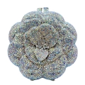 Detailed macro view of the rose-shaped dinner clutch with rainbow crystals and silver frame - Silver AB