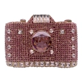 Macro shot of camera-shaped luxury pink rhinestone clutch with crystal lens detail - Pink