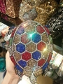 Detail of crystal turtle clutch bag featuring colorful hexagonal rhinestones and metal frame - Iridescent Black