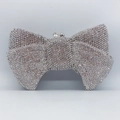 Elegant bow-shaped silver evening clutch bag fully embellished with shimmering rhinestones - Silver