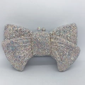 Sparkling bow clutch bag with iridescent rhinestones and luxury metal clasp - Holographic Silver