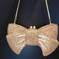 Elegant champagne gold bow clutch bag with sparkling crystals and a fine chain strap - Gold Multi-color with White Lines