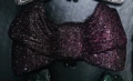 Sparkling dark purple bow clutch bag with pavé crystals and metallic clasp detail - Deep purple