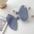 Detailed close-up of soft purple knitted fingerless gloves with Doria Dore brand label - One Size / Blue