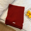 Deep red knitted scarf with black stripes and brand label on white bedding background - 30x180cm / Red (British Striped)