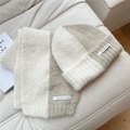 Detailed texture of thick knit scarf and beanie set with minimalist woven label - Beige Splicing Hat and Scarf Set