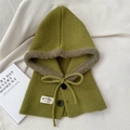 Detail of green knit balaclava featuring faux fur trim, black buttons and drawstring tie - One Size / Green