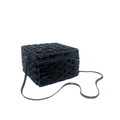 Detailed side view of a black crystal clutch with beaded surface and metal chain - Black