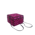 Macro side view of magenta crystal box clutch with black metal frame and chain - Rose Red