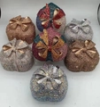 Macro detail of heart-shaped evening clutch bags with crystal rhinestones and bow clasp - Custom Other Colors