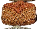 Orange rhinestone evening clutch featuring leaf-patterned crystal scales and flap closure - Orange