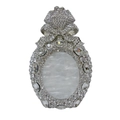 Detail of crystal-encrusted evening clutch with marble inlay and crown clasp - Silver