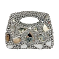 Macro shot of silver evening bag with sparkling rhinestones and mixed geometric crystals - Silver