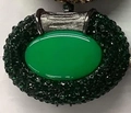 Macro shot of oval green gemstone pendant with micro-pave dark green rhinestone setting - Dark Green
