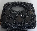 Luxuriöse schwarze Abendtasche mit funkelnden Strasssteinen und großen schwarzen Steinen - Schwarz