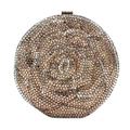 Macro detail of round evening clutch with multi-color floral rhinestone patterns - Champagne