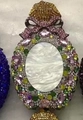 Pink and green crystal encrusted egg-shaped evening clutch with a shell centerpiece - Iridescent Black