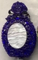 Luxurious egg-shaped clutch bag in deep blue crystals with white shell oval detail - Sapphire Blue
