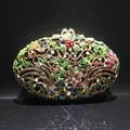 Detailed view of colorful rhinestones and floral enamel on a vintage evening clutch bag - Iridescent Black
