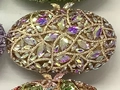 Pochette de soirée ovale ornée de strass AB irisés avec motif de feuilles ciselé - Or AB