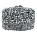 Macro detail of silver evening clutch bag featuring intricate crystal floral patterns - Silver