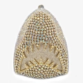 Macro shot of shark-shaped evening clutch bag featuring colorful sparkling rhinestones - Gold AB