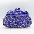 Luxurious royal blue crystal clutch bag with gold floral accents and a jewel clasp - Sapphire Blue