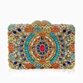 Macro detail of multicolored crystals and heart clasp on golden evening clutch bag - Gold Blue Multi