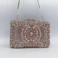 Detailed view of silver rhinestone evening clutch bag with heart clasp and chain strap - Silver Champagne