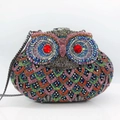 Sparkling owl-shaped clutch bag with colorful rhinestones and red gem eyes detail - Iridescent Black