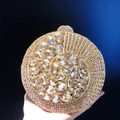 Elegante borsa da sera rotonda dorata con strass champagne a spirale e chiusura in metallo - Oro Spirale