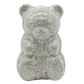 Macro shot of silver crystal gummy bear clutch bag with sparkling rhinestone surface - Silver