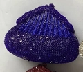 Close-up of luxury rhinestone evening bags with sparkling crystal texture and shell shape - Sapphire Blue